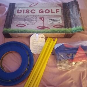 Disc Golf Set with Yellow Poles and Blue Discs